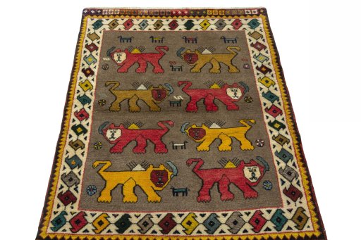 Surface texture of 2000s Persian Gabbeh rug with natural Wool and intricate pattern