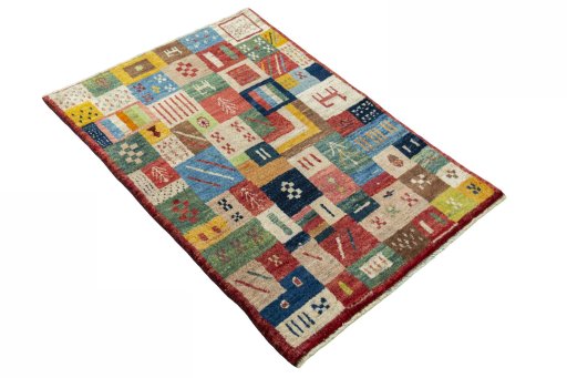 Close-up detail of 2000s Persian Gabbeh rug from Iran / Persia showing Wool weave