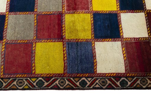 Close-up detail of 2000s Persian Gabbeh rug from Iran / Persia showing Wool weave