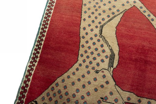 Backside of handmade 2000s Persian Gabbeh rug showing knot structure and weave density