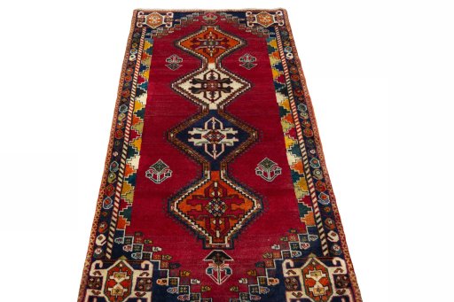 Surface texture of 2000s Persian Gabbeh rug with natural Wool and intricate pattern