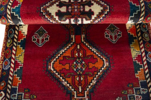 Full view of 2000s Persian Gabbeh rug from Iran / Persia, 196 × 91 cm in Red tones