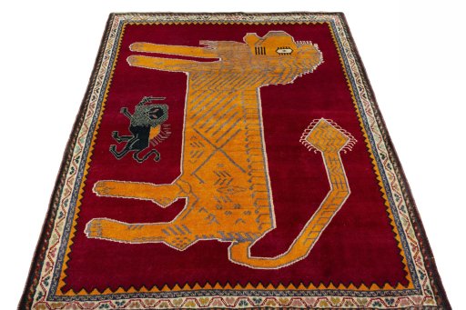Surface texture of 2000s Persian Gabbeh rug with natural Wool and intricate pattern