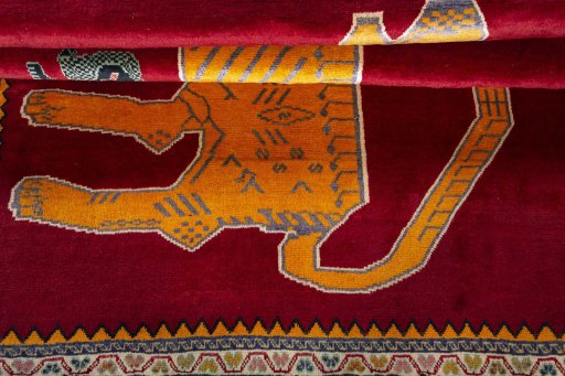Full view of 2000s Persian Gabbeh rug from Iran / Persia, 209 × 151 cm in Red tones