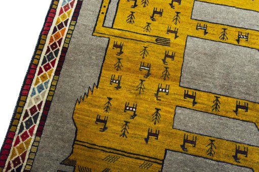 Backside of handmade 2000s Persian Gabbeh rug showing knot structure and weave density
