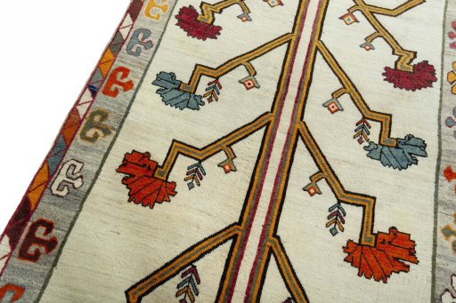 Backside of handmade 2000s Persian Gabbeh rug showing knot structure and weave density