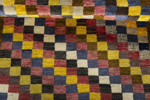 Full view of 2000s Persian Gabbeh rug from Iran / Persia, 145 × 107 cm in Multi Color tones