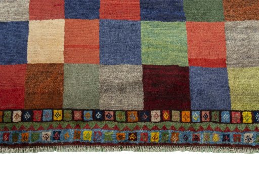 Central medallion detail of 2000s Persian Gabbeh rug from Iran / Persia