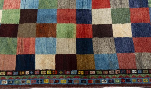 Close-up detail of 2000s Persian Gabbeh rug from Iran / Persia showing Wool weave