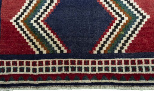 Central medallion detail of 2000s Persian Gabbeh rug from Iran / Persia