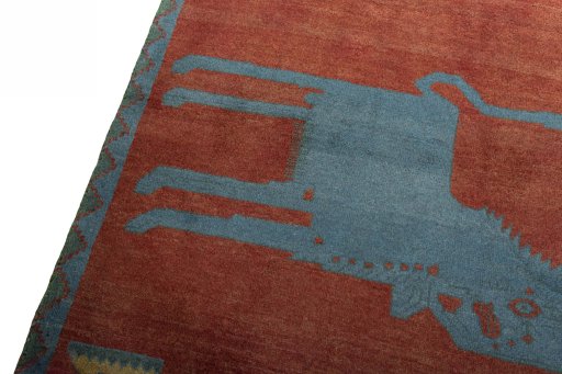Backside of handmade 2000s Persian Gabbeh rug showing knot structure and weave density