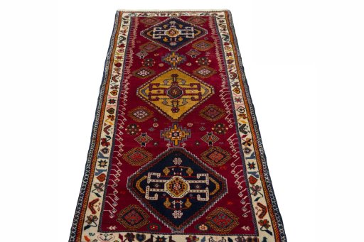 Surface texture of 2000s Persian Gabbeh rug with natural Wool and intricate pattern