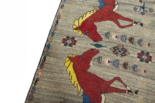 Backside of handmade 2000s Persian Gabbeh rug showing knot structure and weave density