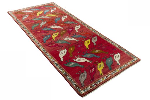 Close-up detail of 2000s Persian Gabbeh rug from Iran / Persia showing Wool weave