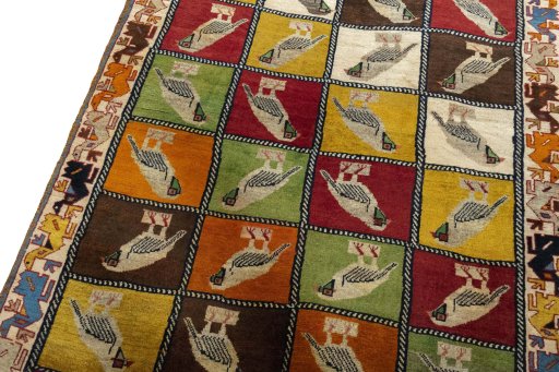 Backside of handmade 1970s Persian Gabbeh rug showing knot structure and weave density
