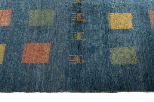 Close-up detail of 2000s Persian Gabbeh rug from Iran / Persia showing Wool weave