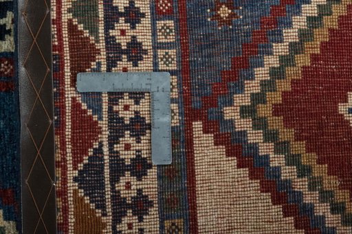Close-up detail of 2000s Persian Gabbeh rug from Iran / Persia showing Wool weave