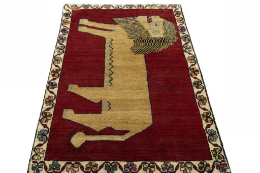 Surface texture of 2000s Persian Gabbeh rug with natural Wool and intricate pattern