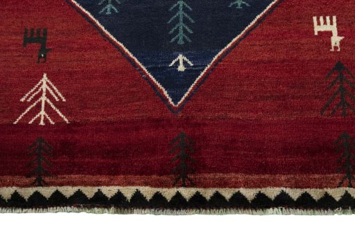 Central medallion detail of 2000s Persian Gabbeh rug from Iran / Persia