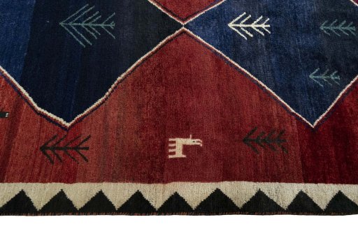 Close-up detail of 2000s Persian Gabbeh rug from Iran / Persia showing Wool weave