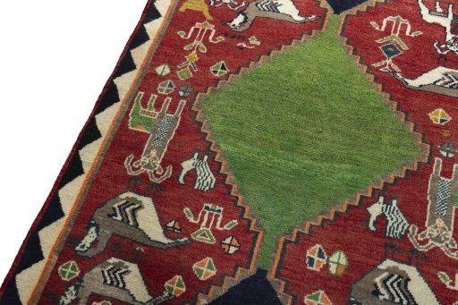 Backside of handmade 2000s Persian Gabbeh rug showing knot structure and weave density