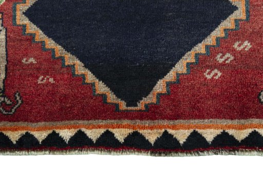 Central medallion detail of 2000s Persian Gabbeh rug from Iran / Persia