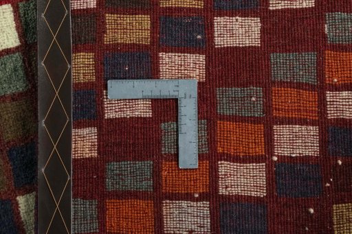 Close-up detail of 2000s Persian Gabbeh rug from Iran / Persia showing Wool weave