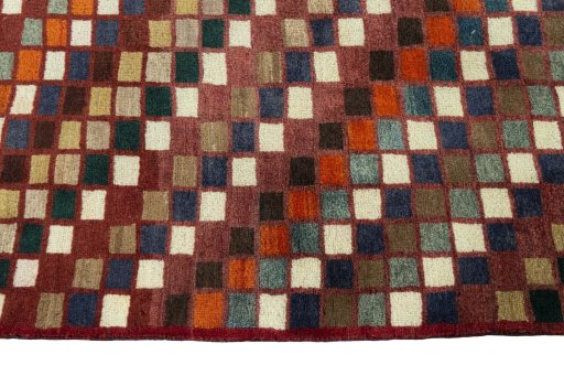 Close-up detail of 2000s Persian Gabbeh rug from Iran / Persia showing Wool weave