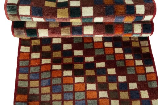 Full view of 2000s Persian Gabbeh rug from Iran / Persia, 190 × 82 cm in Multi Color tones