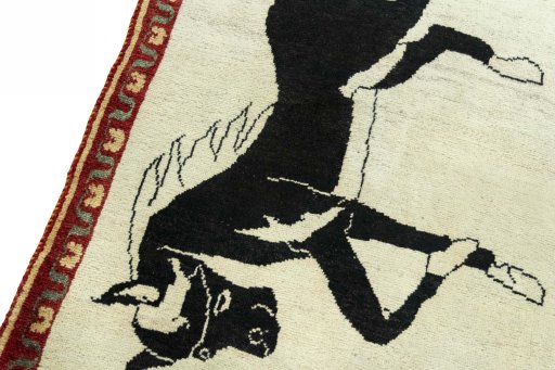 Backside of handmade 2000s Persian Gabbeh rug showing knot structure and weave density