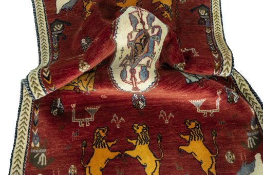 Corner detail of 2000s Persian Gabbeh rug showing border pattern and Wool pile