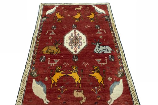 Surface texture of 2000s Persian Gabbeh rug with natural Wool and intricate pattern