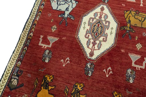 Backside of handmade 2000s Persian Gabbeh rug showing knot structure and weave density