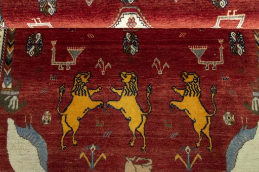 Full view of 2000s Persian Gabbeh rug from Iran / Persia, 193 × 112 cm in Red tones