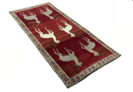 Close-up detail of 2000s Persian Gabbeh rug from Iran / Persia showing Wool weave