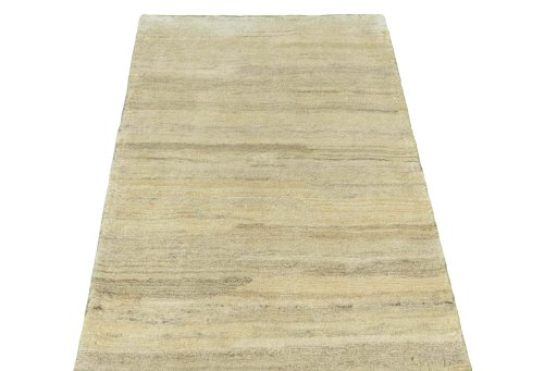 Surface texture of 2000s Persian Gabbeh rug with natural Wool and intricate pattern