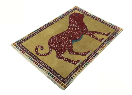 Corner detail of 2000s Persian Gabbeh rug showing border pattern and Wool pile