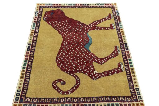 Surface texture of 2000s Persian Gabbeh rug with natural Wool and intricate pattern