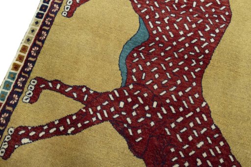 Backside of handmade 2000s Persian Gabbeh rug showing knot structure and weave density