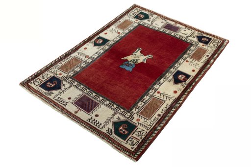 Corner detail of 2000s Persian Gabbeh rug showing border pattern and Wool pile