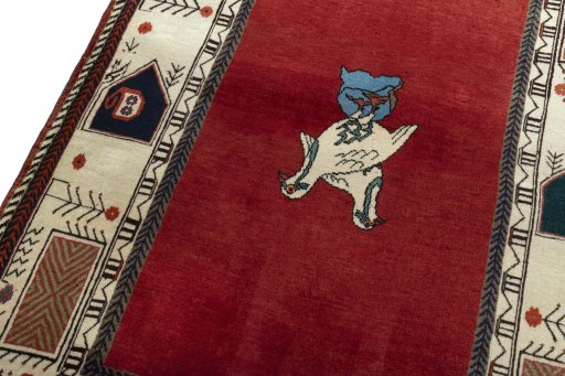 Backside of handmade 2000s Persian Gabbeh rug showing knot structure and weave density
