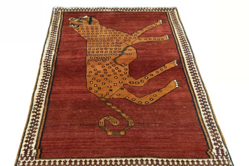 Surface texture of 1970s Persian Gabbeh rug with natural Wool and intricate pattern