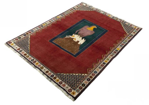 Corner detail of 2000s Persian Gabbeh rug showing border pattern and Wool pile