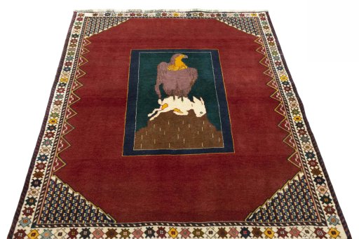 Surface texture of 2000s Persian Gabbeh rug with natural Wool and intricate pattern