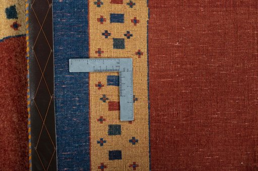 Close-up detail of 2000s Persian Gabbeh rug from Iran / Persia showing Wool weave