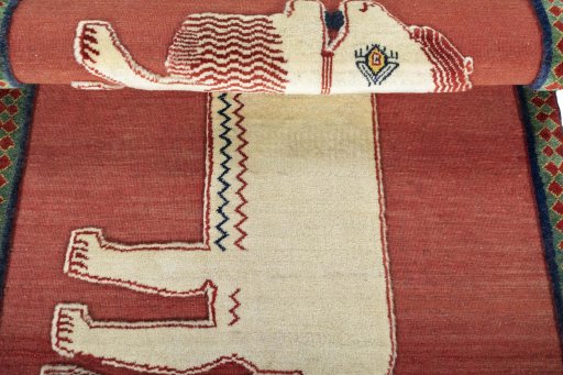 Full view of 2000s Persian Gabbeh rug from Iran / Persia, 151 × 106 cm in Red tones