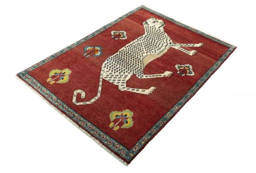 Corner detail of 2000s Persian Gabbeh rug showing border pattern and Wool pile