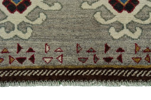 Central medallion detail of 2000s Persian Gabbeh rug from Iran / Persia