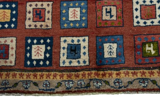 Central medallion detail of 2000s Persian Gabbeh rug from Iran / Persia