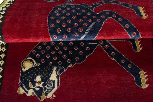 Full view of 2000s Persian Gabbeh rug from Iran / Persia, 164 × 110 cm in Red tones